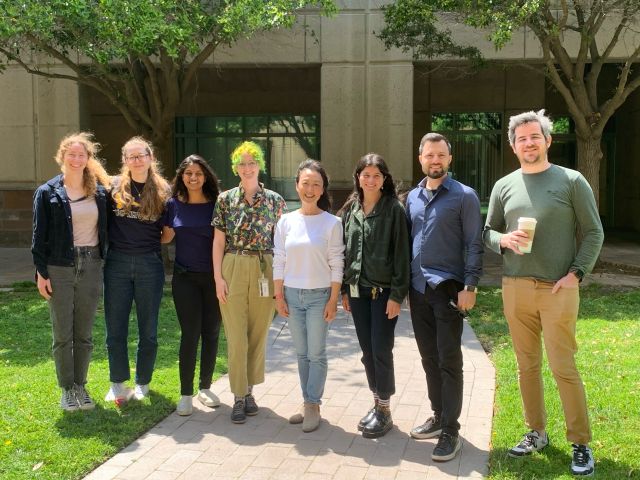 Outside group photo. Center is instructor Christina Tu