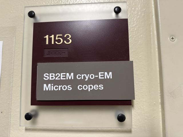 The sign for the room. Facility is ready for microscope installation