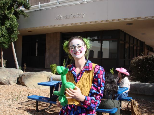 Rowan recieved a balloon animal from SciTrek to match their costume